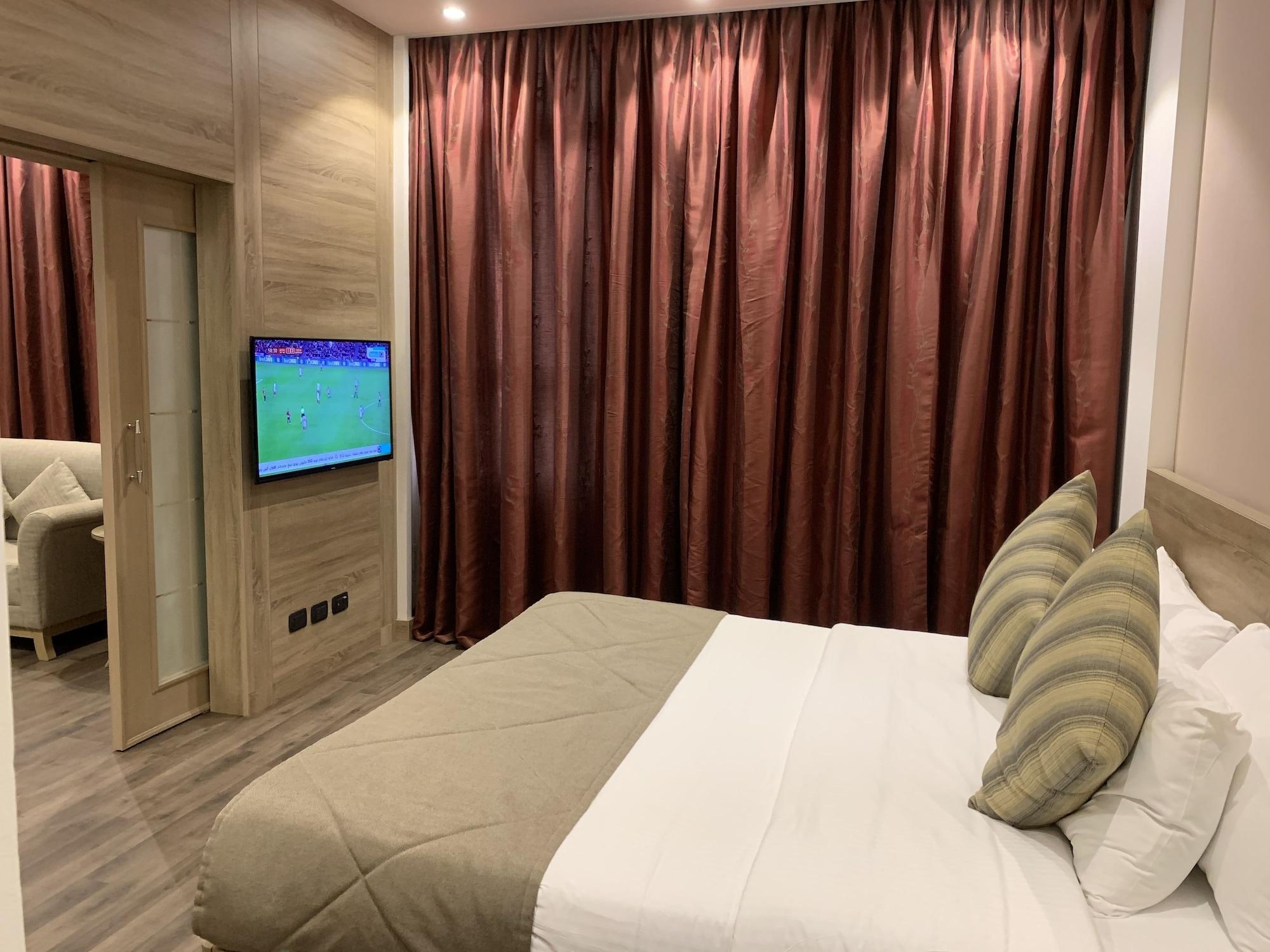 Carlton Al Moaibed Hotel Dammam Exteriör bild A bedroom in the hotel