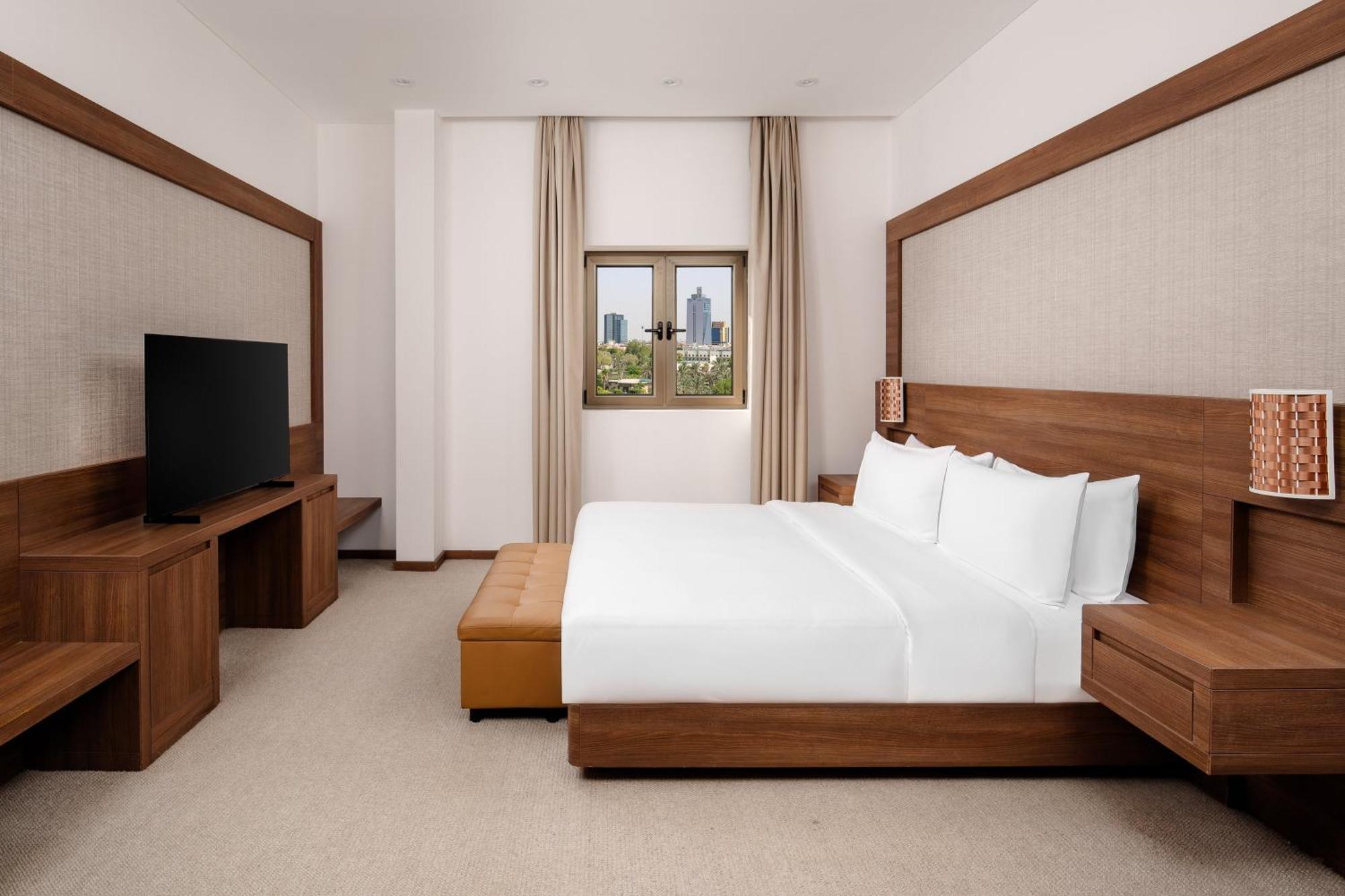 Carlton Al Moaibed Hotel Dammam Exteriör bild A bedroom at the hotel